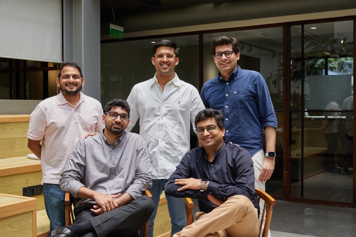 Imaginarium team gathered on the office stairs
